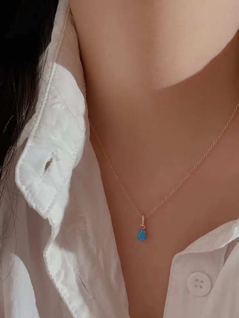 model wearing water drop amazonite birthstone pendant necklace 1